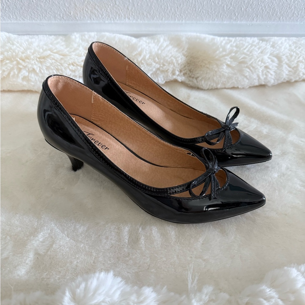 Elegant Black Patent Heels with Bow by Forever